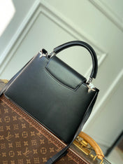 CAPUCINES BB 27 BLACK TAURILLON SILVER HARDWARE