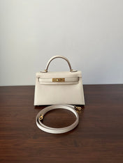 HM KELLY MINI 20 WHITE CHEVRE GOLD HARDWARE