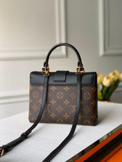 LOCKY BB 21 IN BROWN MONOGRAM CANVAS AND BLACK CALFSKIN GOLD BUCKLE