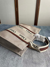LAGRE STRAP WOODY TOTE BAG 45 IN BEIGE LINEN CANVAS BLACK WEBBING LOGO EMBROIDER BROWN CALFSKIN