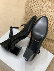 TRIOMPHE T-BAR HIGH PUMPS IN BLACK PATENT CALFSKIN