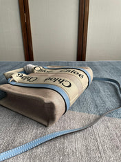 SMALL STRAP WOODY TOTE BAG 26.5 IN BEIGE LINEN CANVAS BLACK WEBBING LOGO EMBROIDER BLUE CALFSKIN