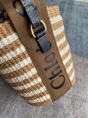 SMALL WOODY BASKET 17 IN BROWN AND WHITE FIBERS BROWN WEBBING BLACK CALFSKIN