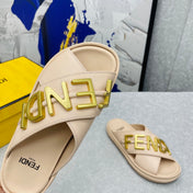 FENDI GRAPHY LOGO LETTERING SLIDES IN BEIGE LAMBSKIN WITH GOLD HARDWARE