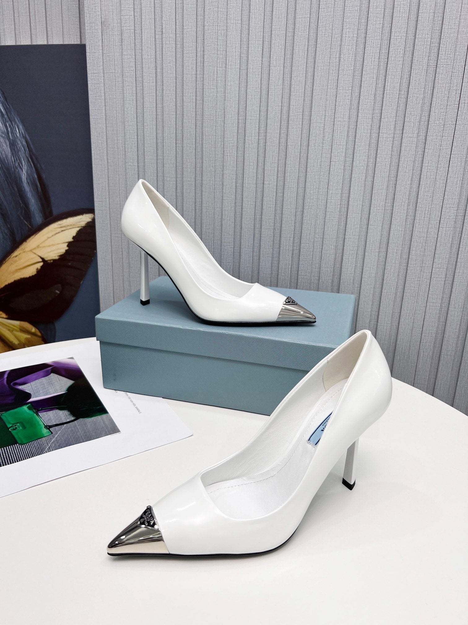 PRADA 26S PUMPS STILETTO HEEL 95MM IN WHITE METAL TIP CALFSKIN