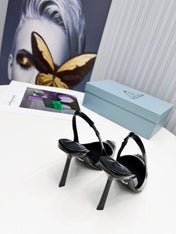 PRADA 26S SLINGBACK HEELS 95MM IN BLACK METAL TIP CALFSKIN