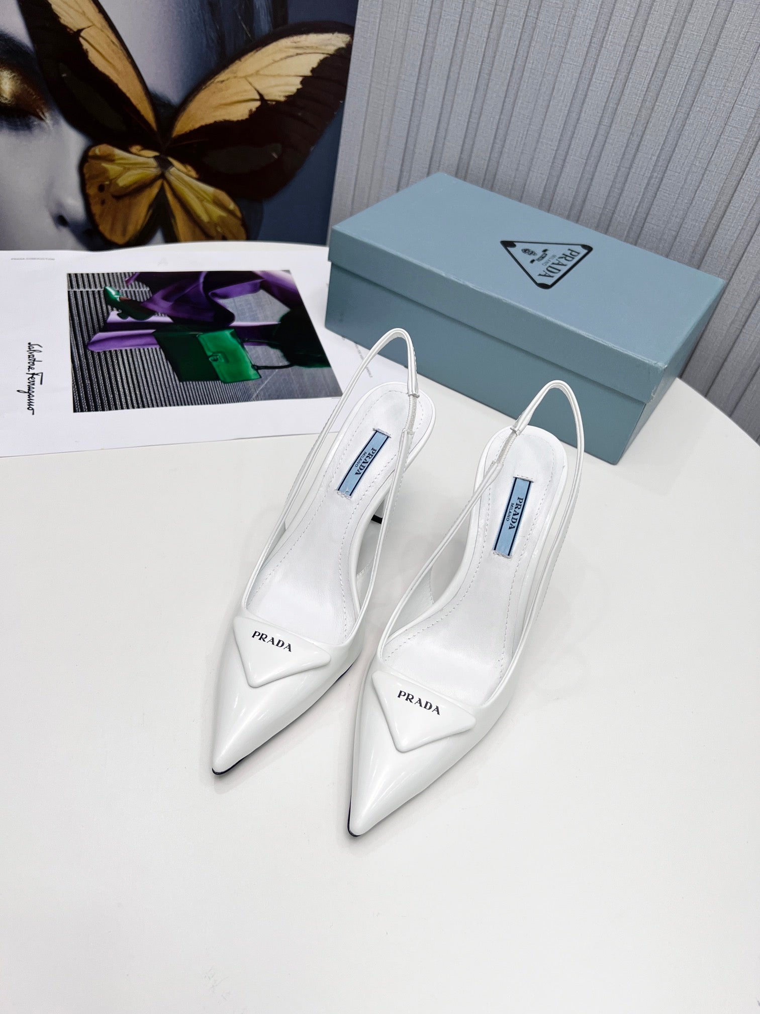PRADA 26S SLINGBACK PUMPS STILETTO HEEL 95MM IN WHITE PATENT CALFSKIN LOGO