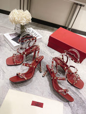 HIGH HEEL 6 CM SANDAL IN RUBY RED LAMBSKIN WITH STUDS