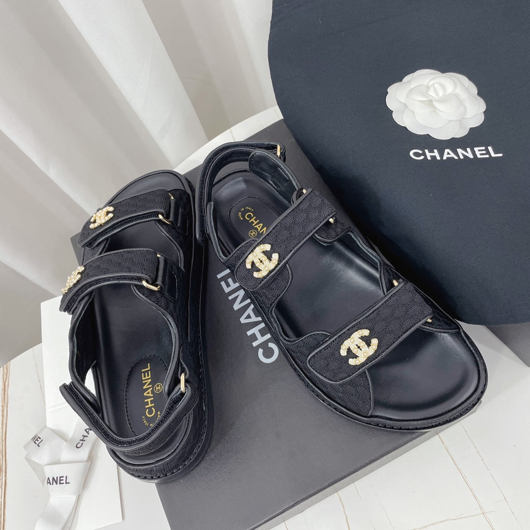 CHANEL 26S SANDALS IN BLACK FABRIC WITH PEARL-EMBELLISHED LOGO