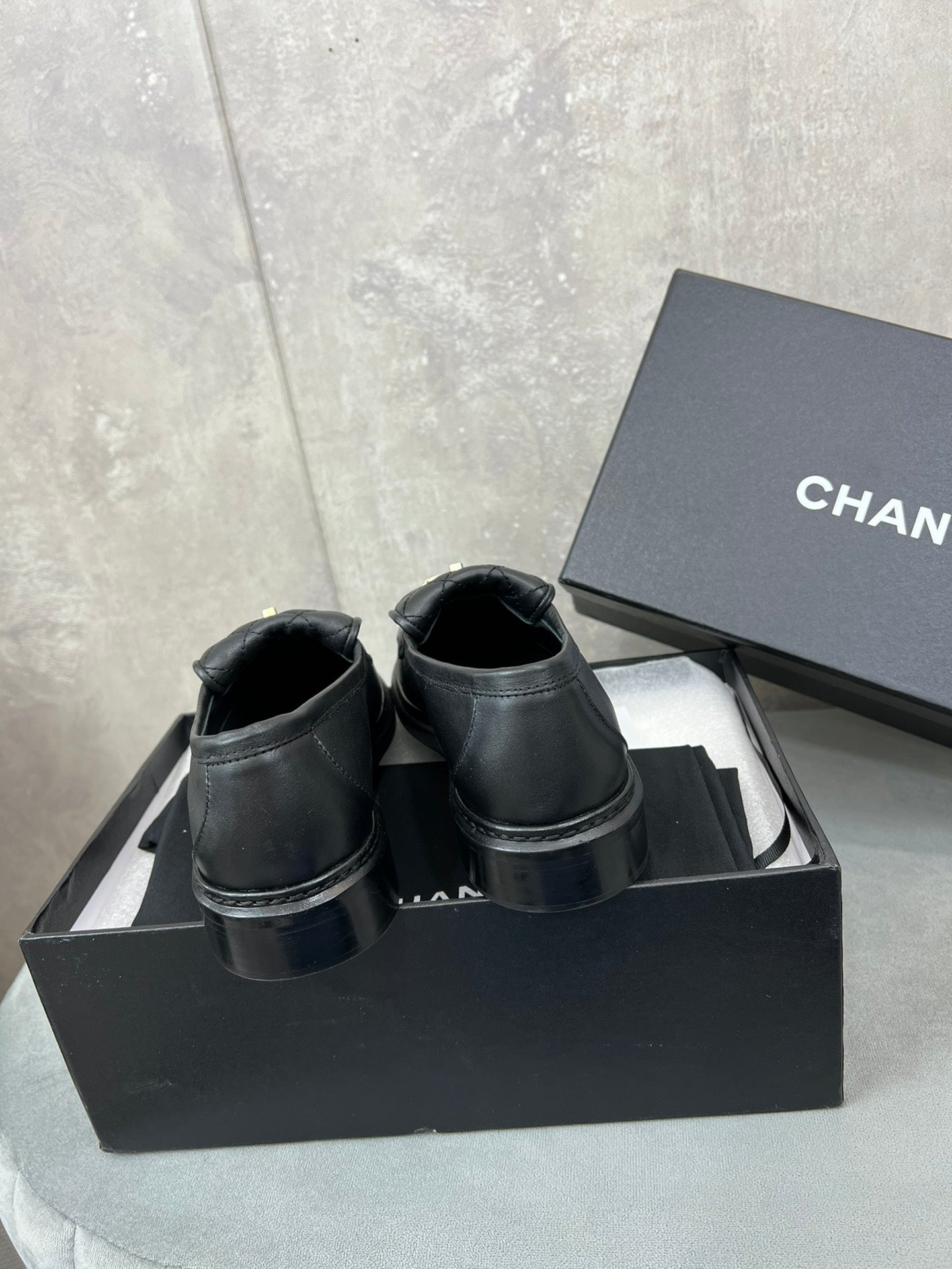 CHANEL 26S LOAFERS IN BLACK QUILTED CALFSKIN WITH CC LOGO