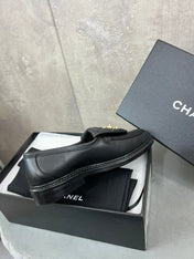 CHANEL 26S LOAFERS IN BLACK QUILTED CALFSKIN WITH CC LOGO