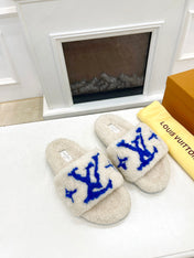 LV FLAT SLIPPER IN WHITE MIX COBALT BLUE SHEARLING