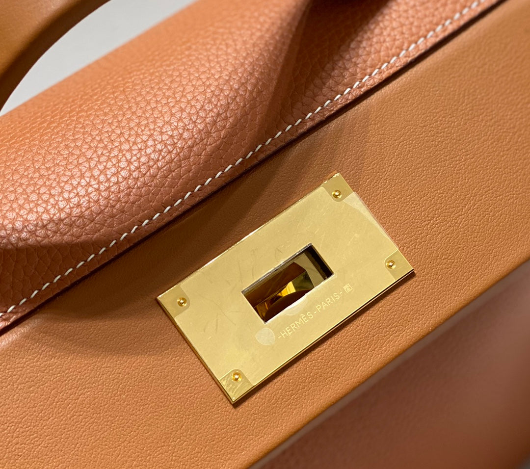 HM 26S 24/24 29MM IN ORANGE EVERCOLOR CALFSKIN GOLD KELLY BUCKLE