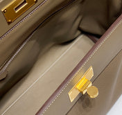 HM 26S 24/24 29MM IN BROWN EVERCOLOR CALFSKIN GOLD KELLY BUCKLE