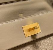 HM 26S 24/24 29MM IN BROWN EVERCOLOR CALFSKIN GOLD KELLY BUCKLE