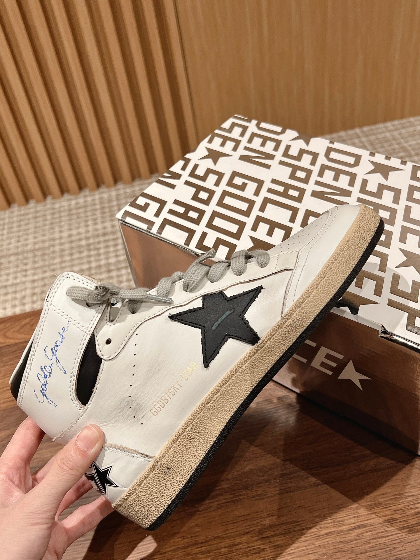 SKY-STAR SNEAKERS IN WHITE NAPPA LAMBSKIN WITH BLACK STAR AND HEEL TAB