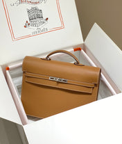 KELLY DEPECHES 38 BRIEFCASE IN GOLD TOGO CALFSKIN SILVER HARDWARE