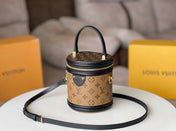 LV 25S PETIT NOE  16 IN BROWN MONOGRAM COATED CANVAS LEATHER TRIM BLACK