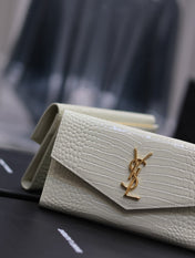 UPTOWN WALLET 21 IN WHITE CROCODILE PATTERN CALFSKIN GOLD LOGO
