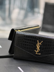 UPTOWN WALLET 21 IN BLACK CROCODILE PATTERN CALFSKIN GOLD LOGO