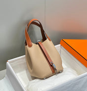 HERMES 25S PICOTIN LOCK 18 IN BURNT ORANGE AND LIGHT BROWN CALFSKIN SILVER HARDWARE