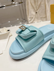 FENDI BAGUETTE SLIPPERS IN SKY BLUE LAMBSKIN WITH GOLD HARDWARE