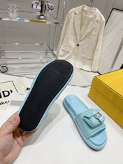 FENDI BAGUETTE SLIPPERS IN SKY BLUE LAMBSKIN WITH GOLD HARDWARE
