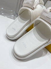 FENDI BAGUETTE SLIPPERS IN WHITE LAMBSKIN WITH GOLD HARDWARE