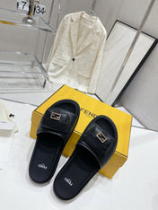 FENDI BAGUETTE SLIPPERS IN BLACK LAMBSKIN WITH GOLD HARDWARE