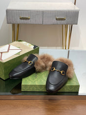 HORSEBIT MULE IN BLACK CALFSKIN AND LAMB WOOL LINING