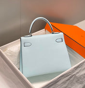 KELLY 28CM IN BLUE BRUME EPSOM CALFSKIN PALLADIUM HARDWARE