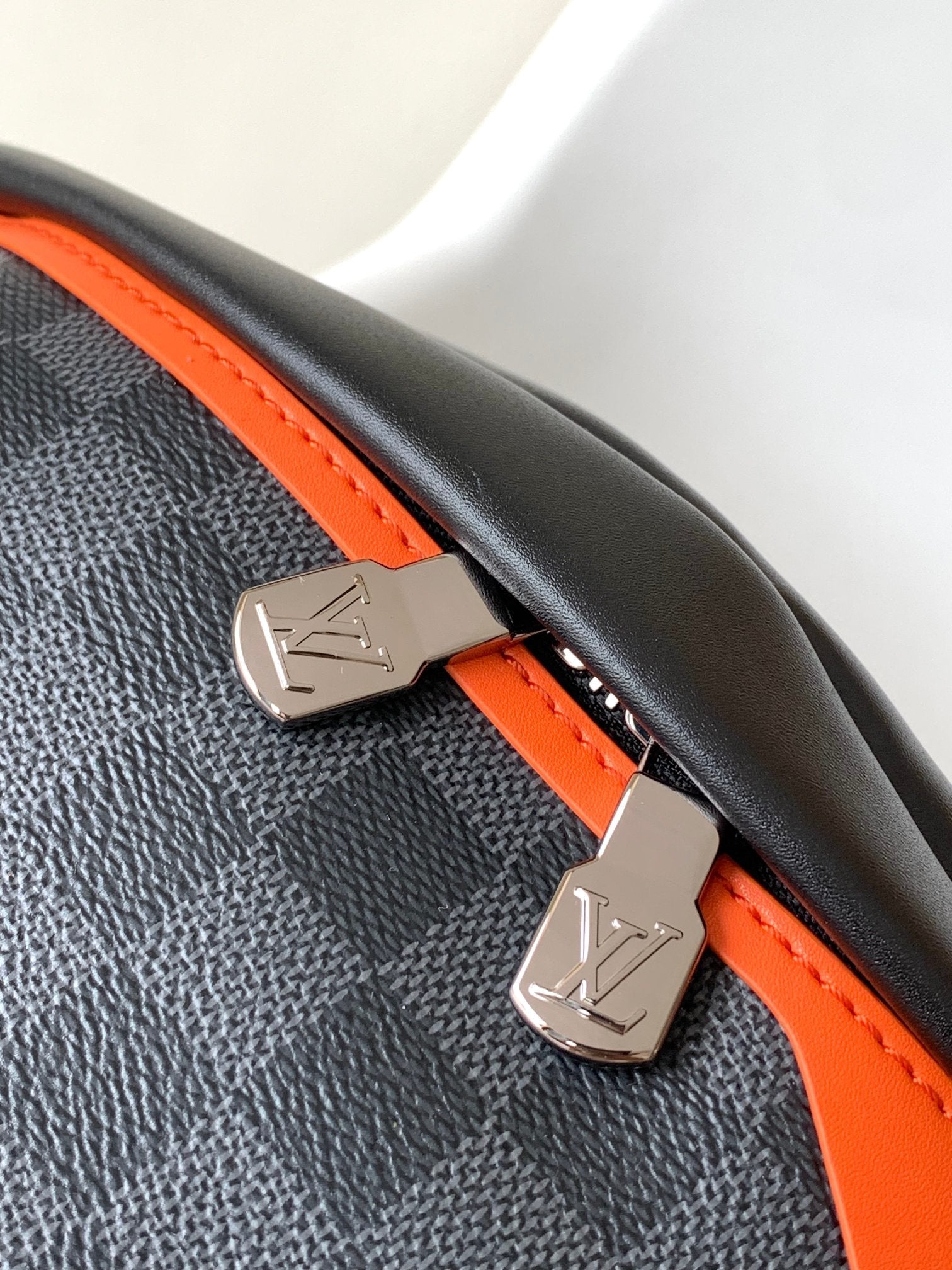 LV 25S BUMBAG 37 IN BLACK AND ORANGE COATED MONOGRAM CALFSKIN