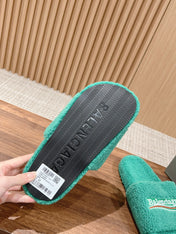 FURRY SLIDES IN TURQUOISE CURLY SHEARLING