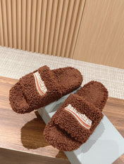 FURRY SLIDES IN BROWN CURLY SHEARLING