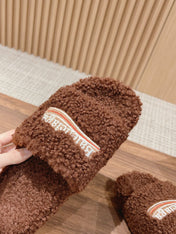 FURRY SLIDES IN BROWN CURLY SHEARLING