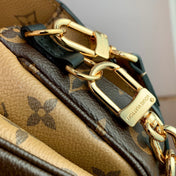 POCHETTE MÉTIS EAST WEST 21.5 IN BROWN MONOGRAM COATED CANVAS AND CALFSKIN