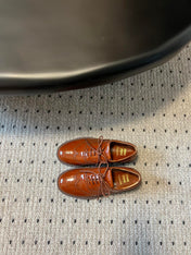 MIUMIU 26S LACE-UP BROGUE LOAFERS IN RUST ORANGE PATENT CALFSKIN