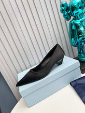 PRADA 26S POINTED TOE PUMPS 40MM IN BLACK SATIN