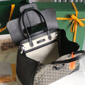 SAIGON SOUPLE BAG 34 IN BLACK GOYARDINE CANVAS AND CALFSKIN