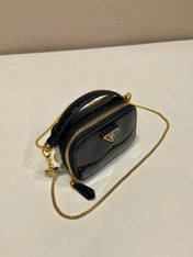 MINI HAND BAG 11 WITH GOLD STRAP IN BLACK PATENT CALFSKIN