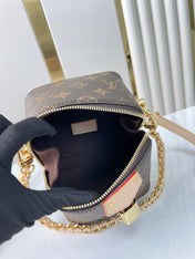 JUST IN CASE 14 IN BROWN MONOGRAM CANVAS GOLD HARDWARE