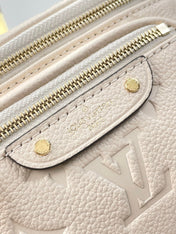 MINI BUMBAG 17 IN CREAM MONOGRAM EMPREINTE LEATHER GOLD HARDWARE