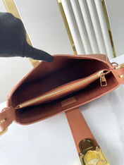LOW KEY SHOULDER BAG 26 IN COGNAC GRAINED CALFSKIN GOLD BUCKLE