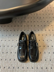 MIUMIU 26S SLIP-ON LOAFERS IN BLACK CALFSKIN SQUARE BUCKLE
