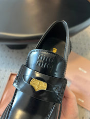 MIUMIU 26S LOAFERS 60MM IN BLACK SHINY CALFSKIN