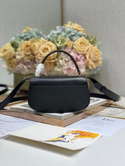 SMALL 19 MONTAIGNE AVENUE TOP HANDLE BAG BLACK SMOOTH CALFSKIN 221147