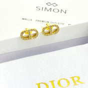 CD 26S CRYSTAL LOGO STUD EARRINGS IN GOLD METAL 633106