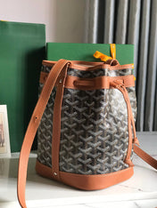 PETIT FLOT BUCKET BAG 22 IN BLACK GOYARDINE CANVAS AND TAN LAMBSKIN TRIM