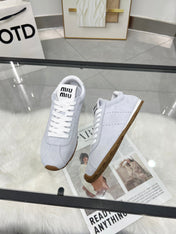MIUMIU 26S SNEAKERS IN BLUE GRAY SUEDE