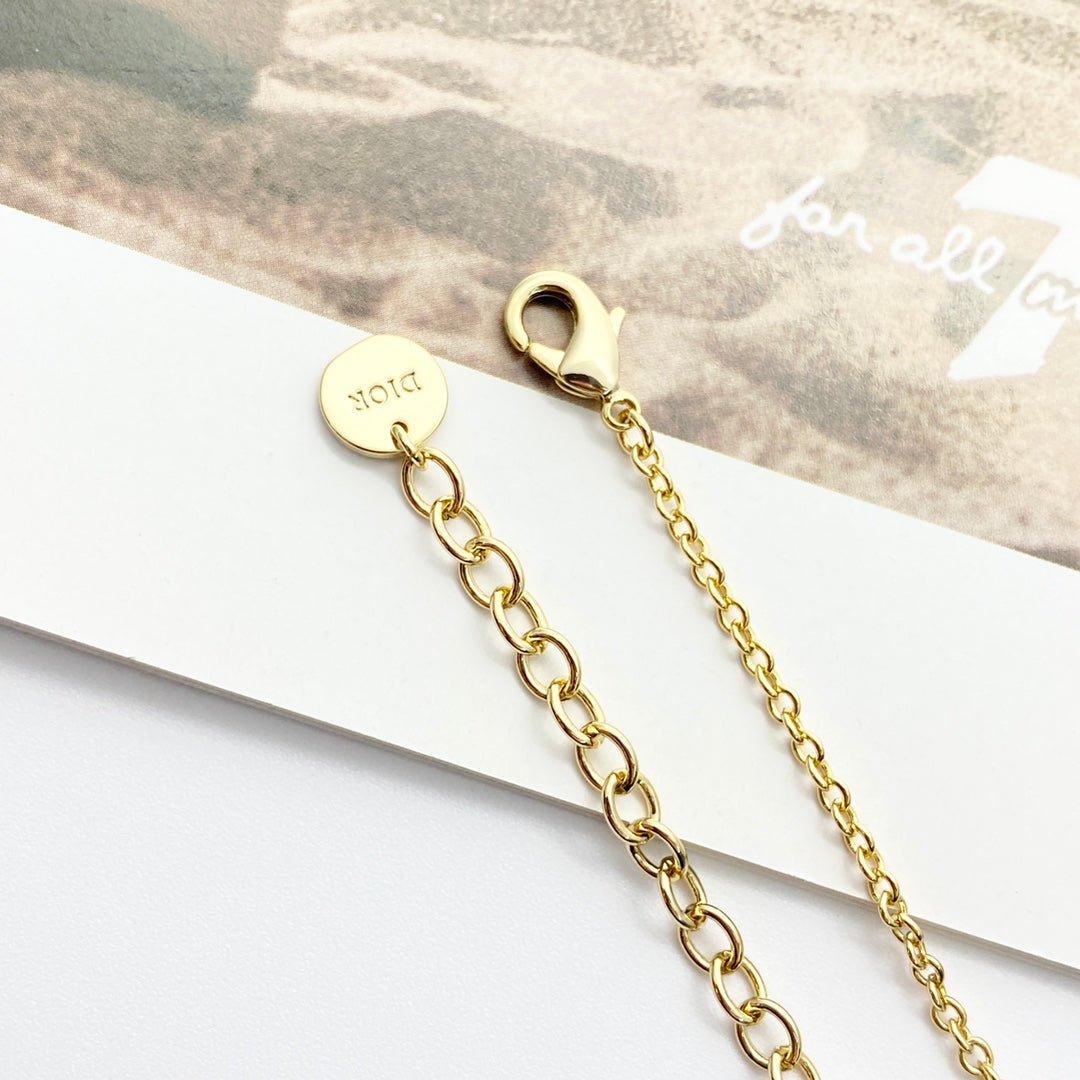 CD 26S MULTI CHARM LAYERED DIOR NECKLACE WITH PEARL DROP IN GOLD TONE 631779